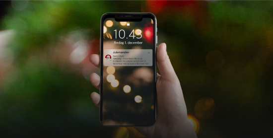 En jule-SMS fra Julemanden vist på en mobiltelefon