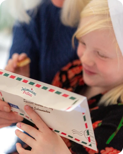 et billede af julemandens posthus' julebrev sendt fra julemanden til den du holder af